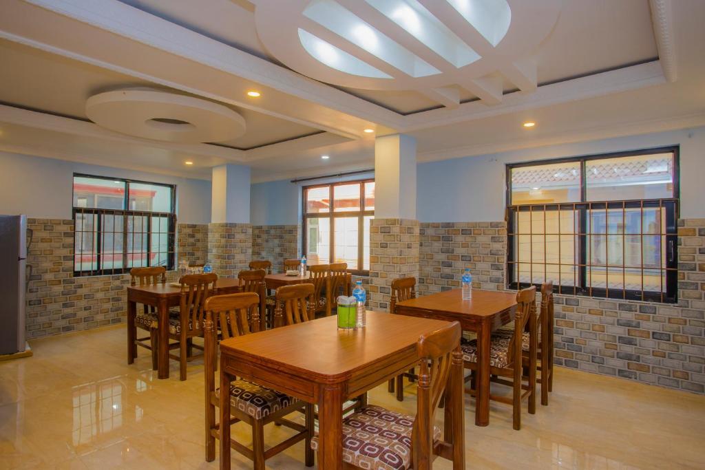 Restaurace v ubytování OYO 273 Hotel Rara Palace