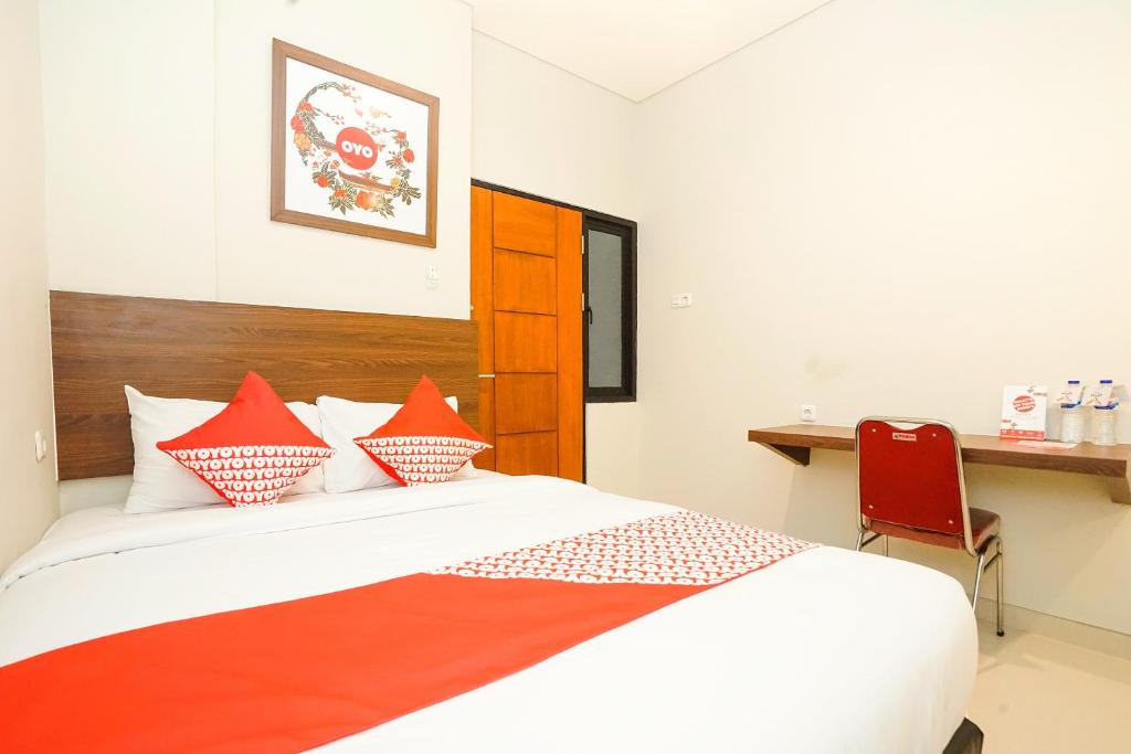 Letto o letti in una camera di Super OYO Capital O 449 The Colins