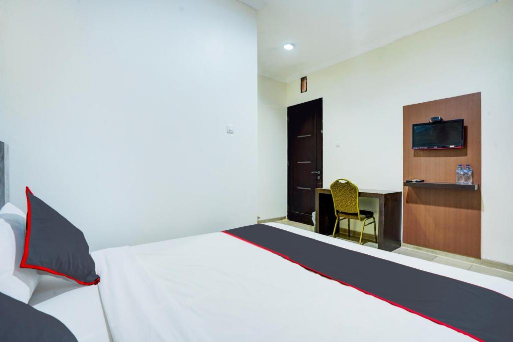 TV a/nebo společenská místnost v ubytování Hotel O Padang City Center Near Pantai Padang Formerly D'Dhave Hotel