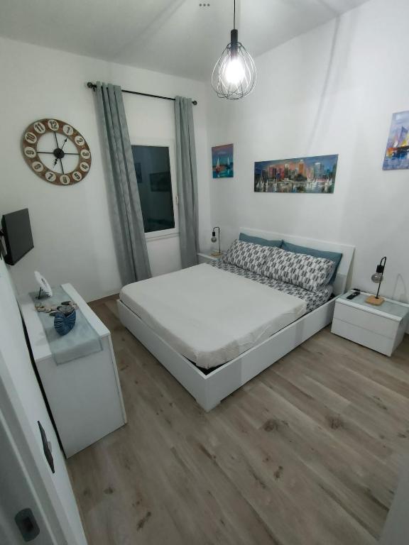 Postel nebo postele na pokoji v ubytování Casa di Teo