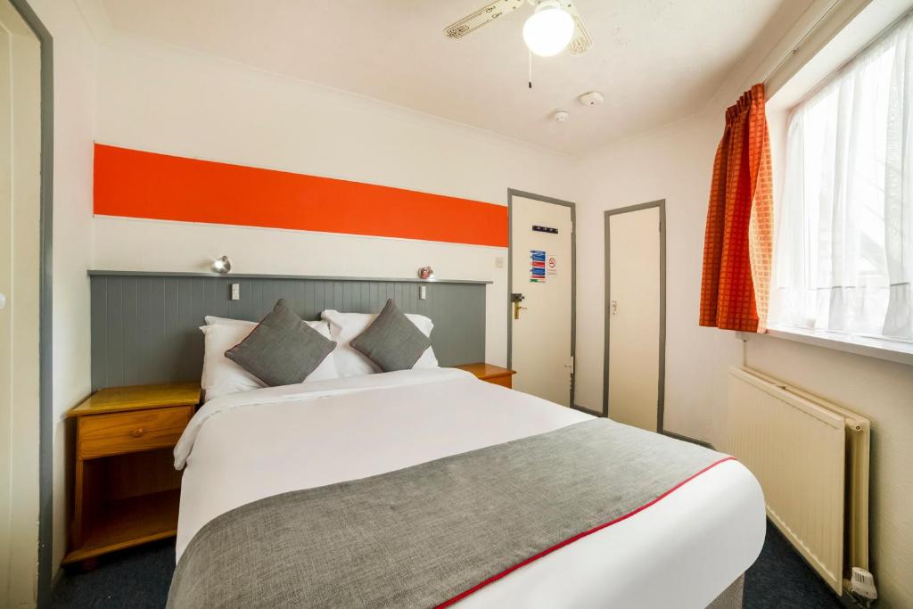 Postel nebo postele na pokoji v ubytování Marina Hotel