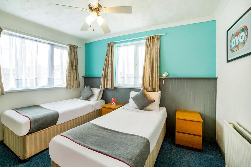 Postel nebo postele na pokoji v ubytování Marina Hotel