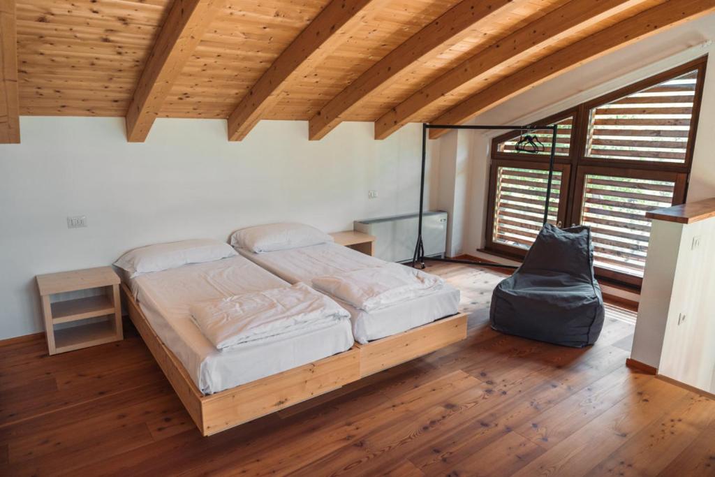 Postel nebo postele na pokoji v ubytování Resort Drena