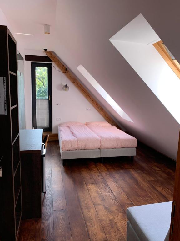 Posteľ alebo postele v izbe v ubytovaní Black House 88