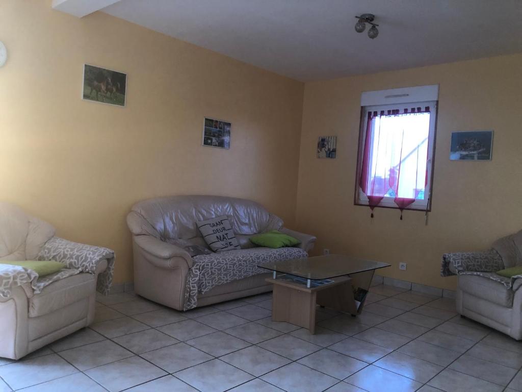 Posezení v ubytování Gîte Argouges