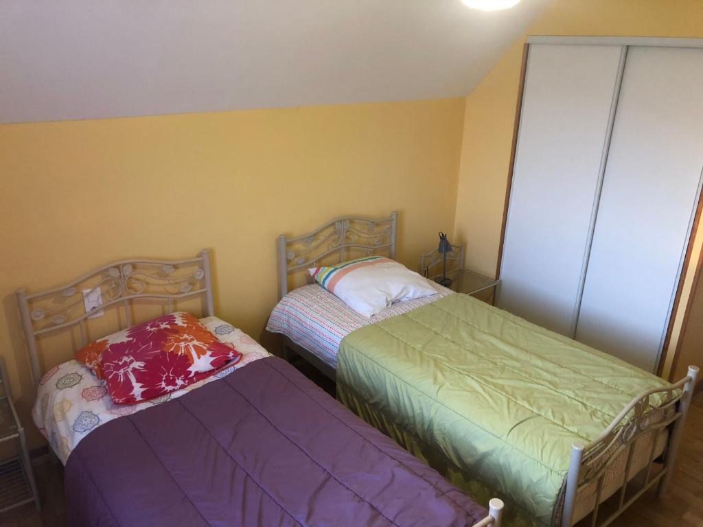 Postel nebo postele na pokoji v ubytování Gîte Argouges
