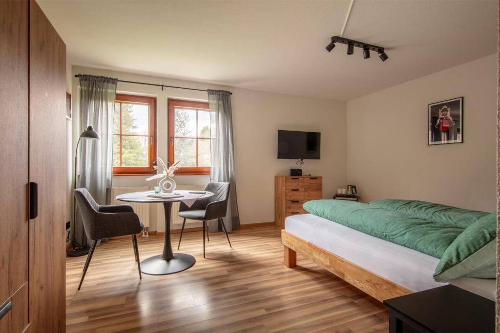 Postel nebo postele na pokoji v ubytování Gästehaus Kaltenbach