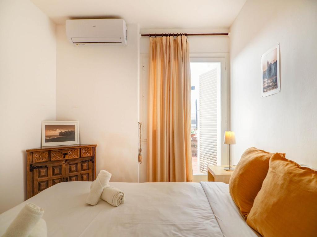 Postel nebo postele na pokoji v ubytování Gladiator Apartment by Hello Homes Sitges