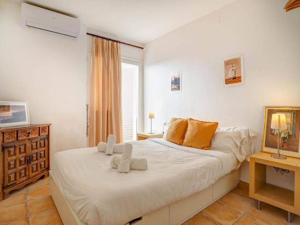 Postel nebo postele na pokoji v ubytování Gladiator Apartment by Hello Homes Sitges