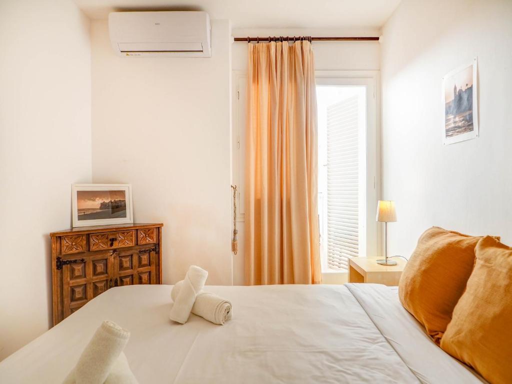 Postel nebo postele na pokoji v ubytování Gladiator Apartment by Hello Homes Sitges