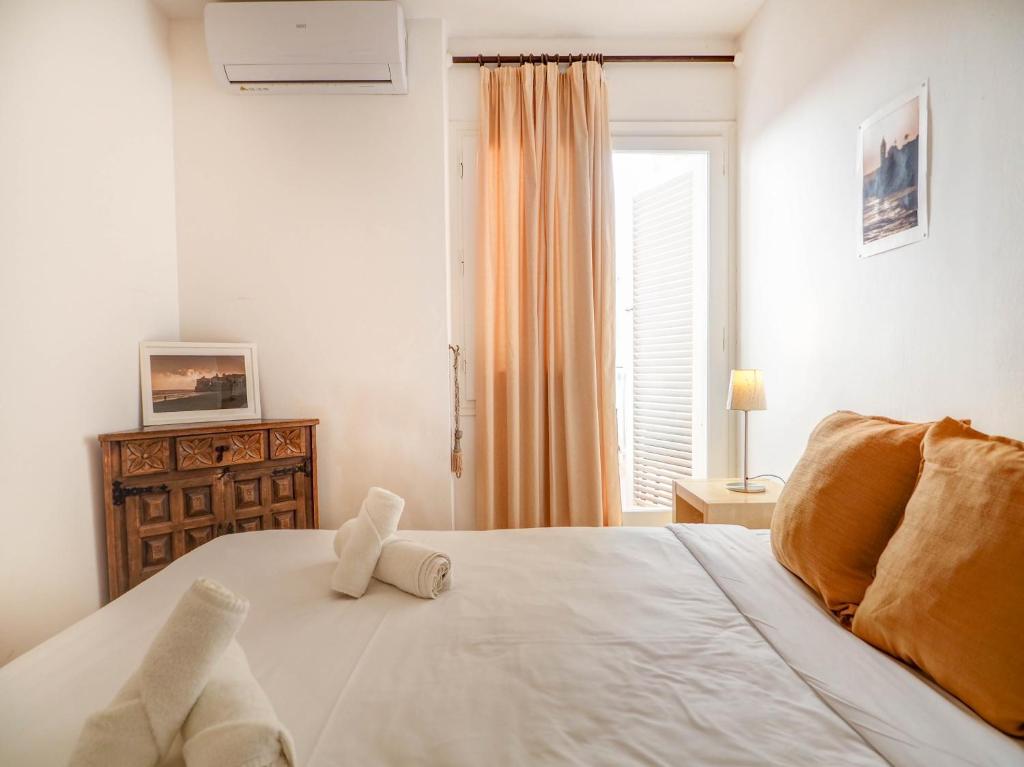 Postel nebo postele na pokoji v ubytování Gladiator Apartment by Hello Homes Sitges