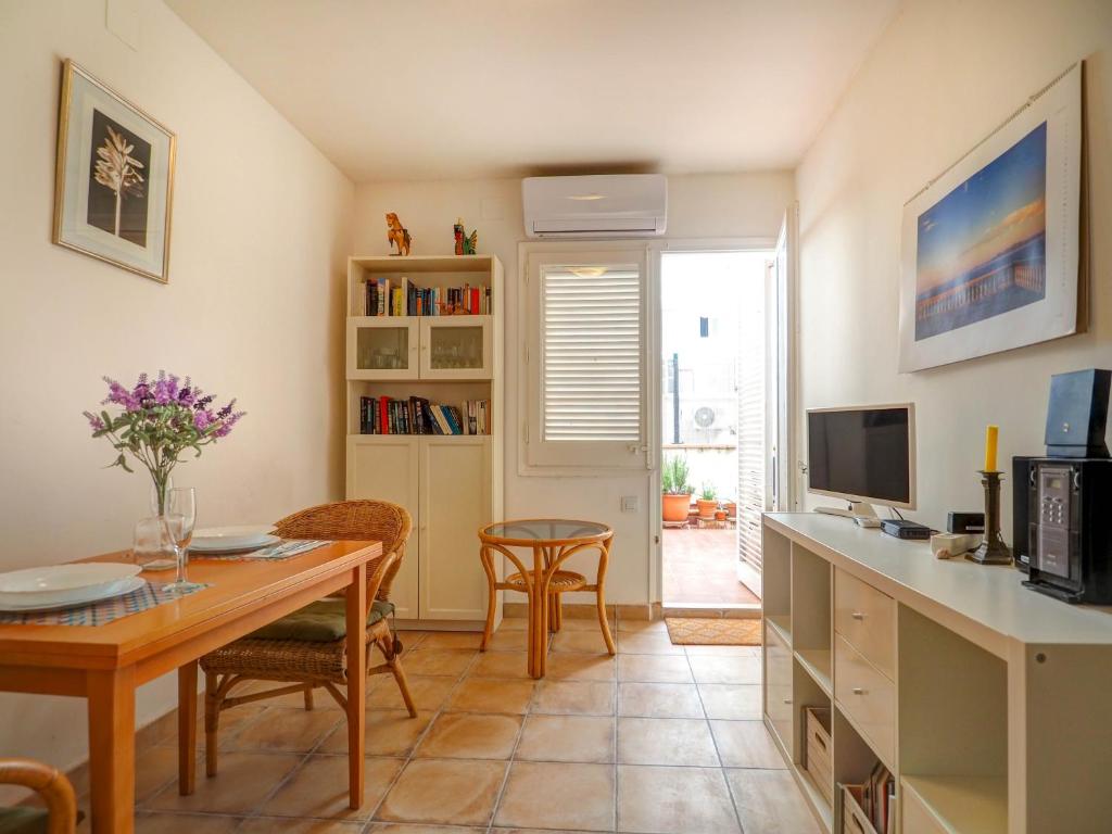 TV a/nebo společenská místnost v ubytování Gladiator Apartment by Hello Homes Sitges