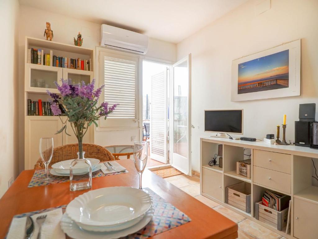 TV a/nebo společenská místnost v ubytování Gladiator Apartment by Hello Homes Sitges