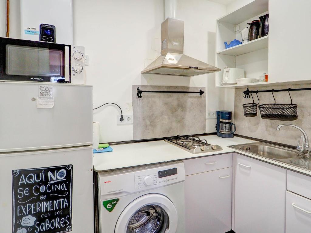 Kuchyň nebo kuchyňský kout v ubytování Gladiator Apartment by Hello Homes Sitges