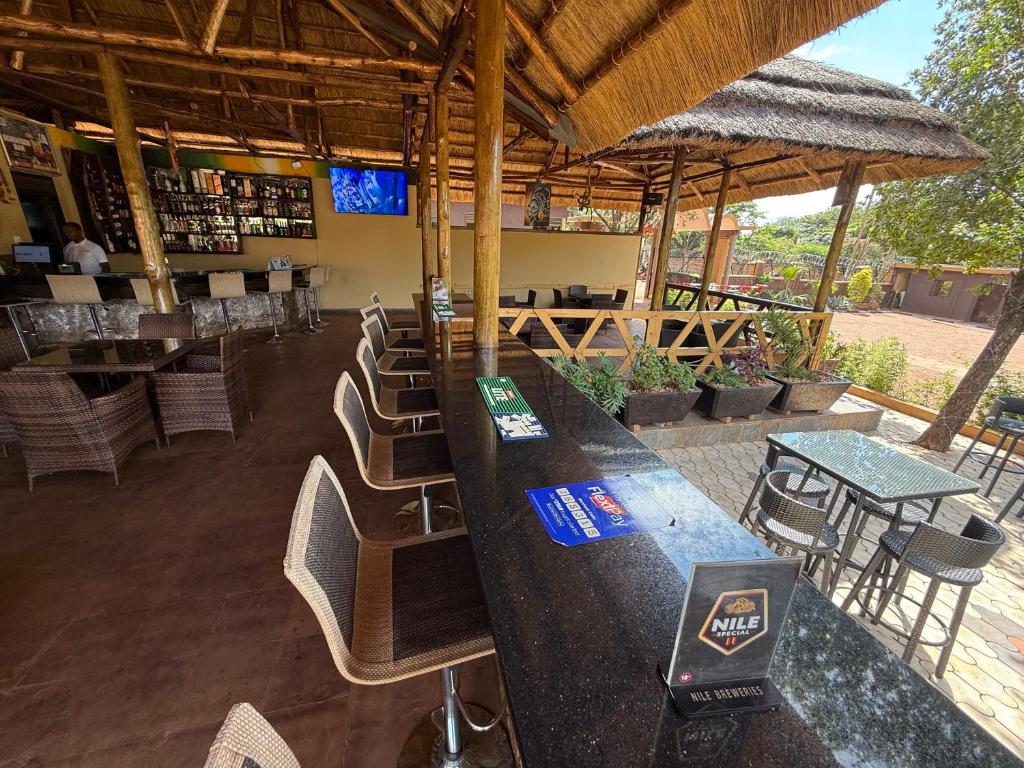Restoran või mõni muu söögikoht majutusasutuses Signature Resort Hotel Jinja