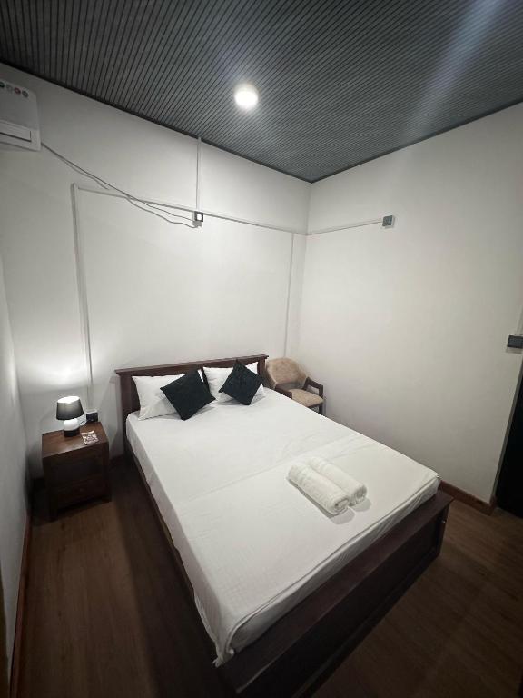 Postel nebo postele na pokoji v ubytování Singhagiri Haven Sigiriya