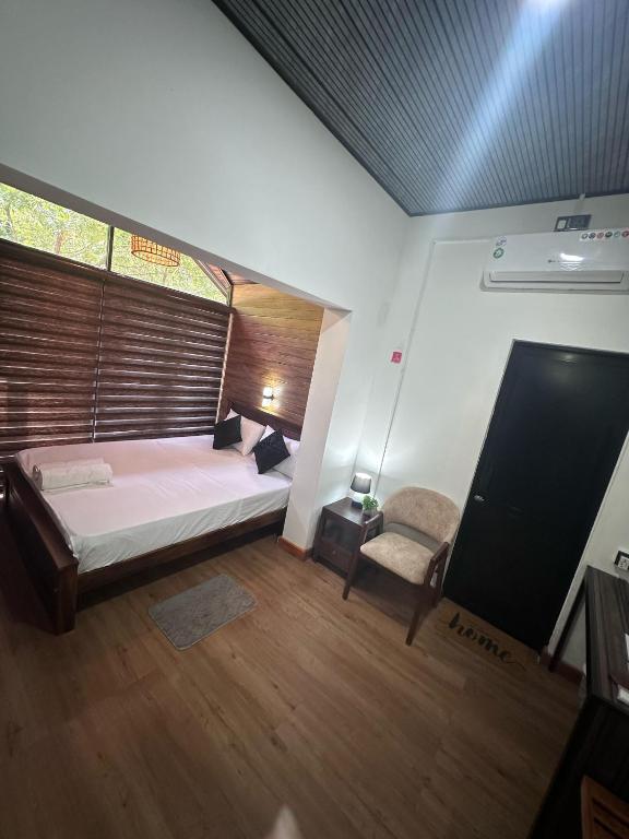 Postel nebo postele na pokoji v ubytování Singhagiri Haven Sigiriya