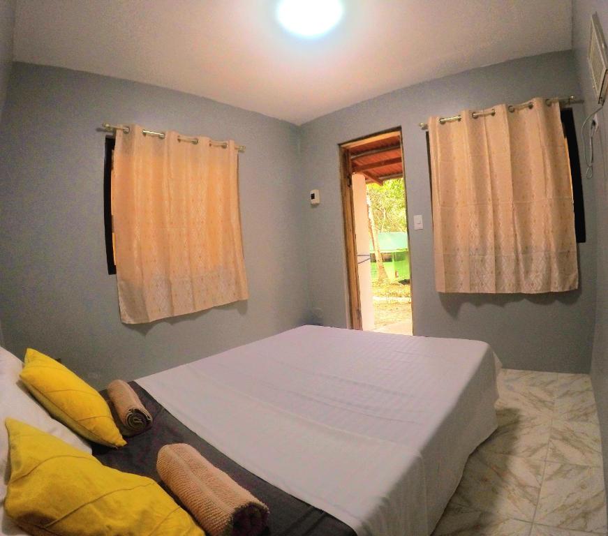 Postel nebo postele na pokoji v ubytování Al Hamra Jungle Resort