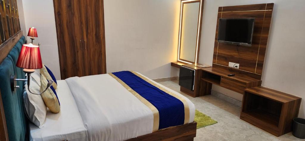 Postel nebo postele na pokoji v ubytování Hotel Agra Hotel Grand View