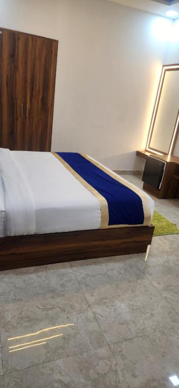 Postel nebo postele na pokoji v ubytování Hotel Agra Hotel Grand View