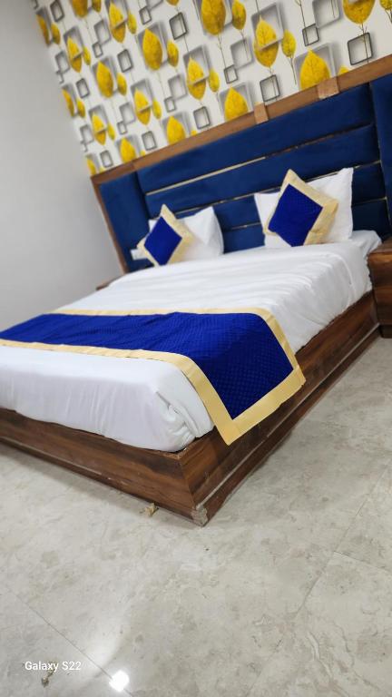 Postel nebo postele na pokoji v ubytování Hotel Agra Hotel Grand View
