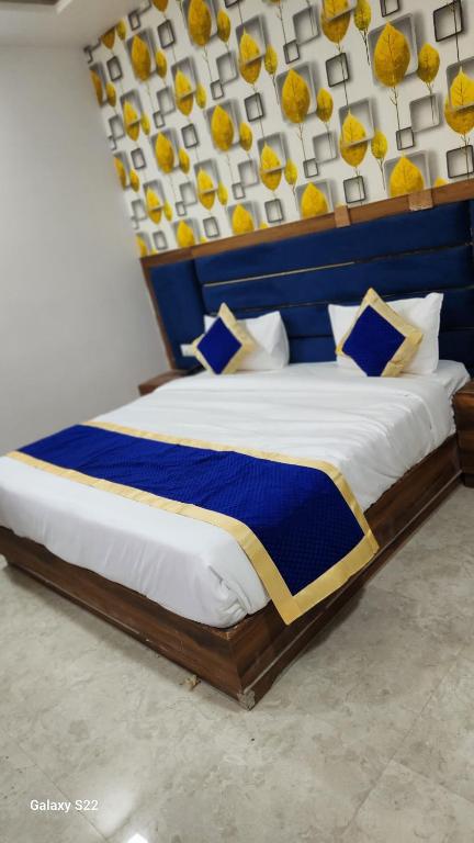 Postel nebo postele na pokoji v ubytování Hotel Agra Hotel Grand View