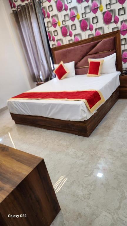 Postel nebo postele na pokoji v ubytování Hotel Agra Hotel Grand View