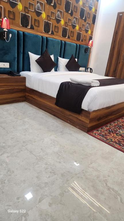 Postel nebo postele na pokoji v ubytování Hotel Agra Hotel Grand View