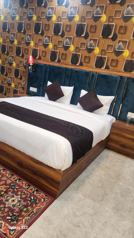 Postel nebo postele na pokoji v ubytování Hotel Agra Hotel Grand View