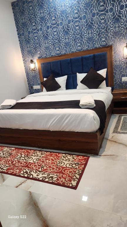 Postel nebo postele na pokoji v ubytování Hotel Agra Hotel Grand View