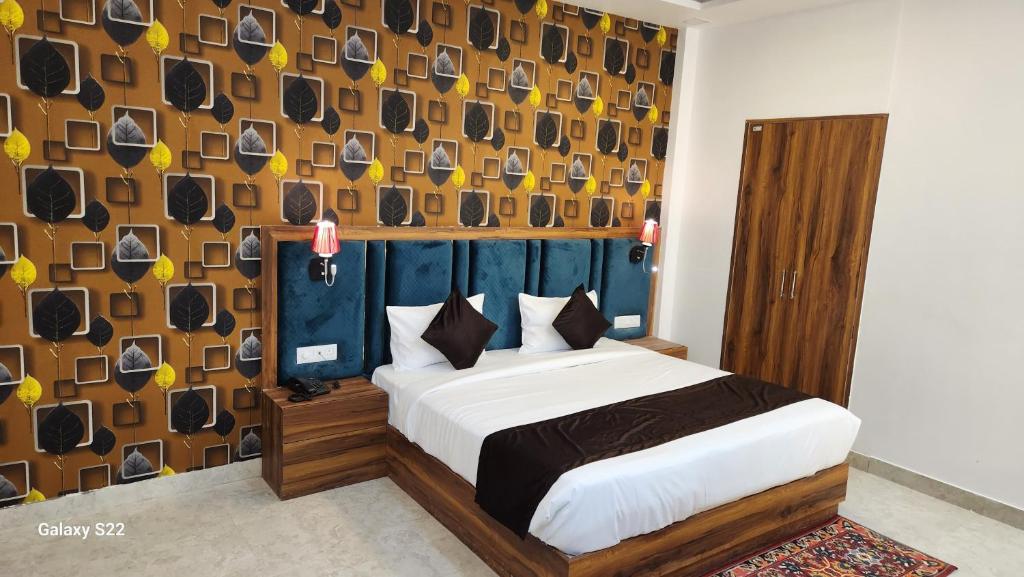 Postel nebo postele na pokoji v ubytování Hotel Agra Hotel Grand View
