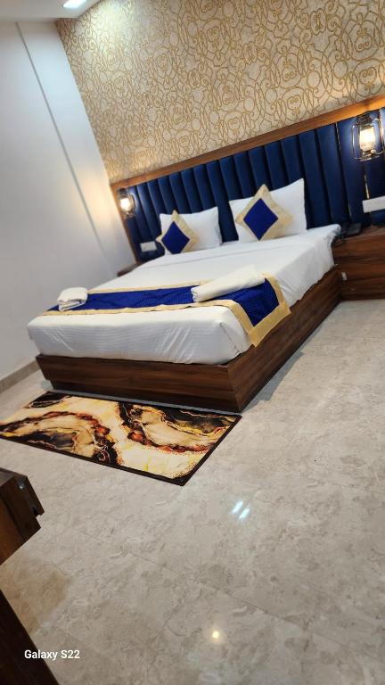Postel nebo postele na pokoji v ubytování Hotel Agra Hotel Grand View