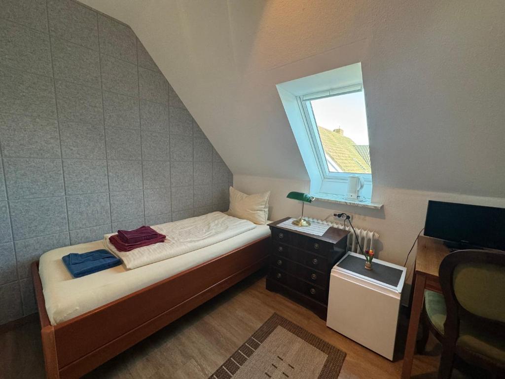 Postel nebo postele na pokoji v ubytování Haus Ostseestrand36