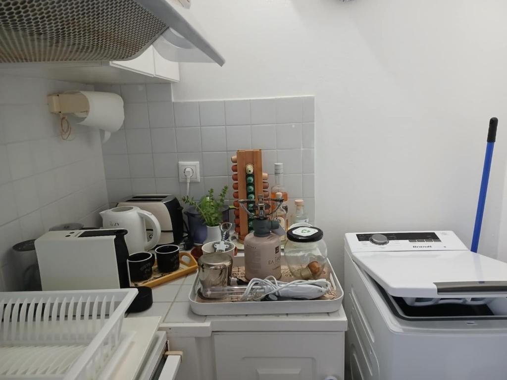 Kuchyň nebo kuchyňský kout v ubytování Serenity Maisonnette