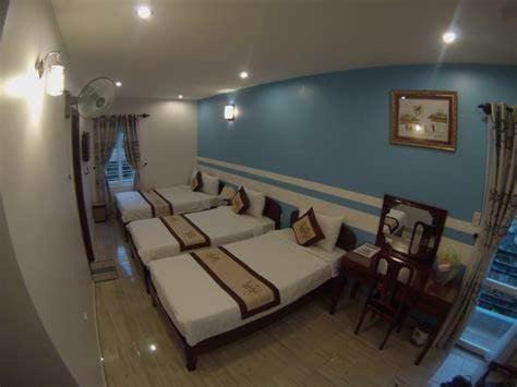 Postel nebo postele na pokoji v ubytování Hong Thien Ruby Hotel