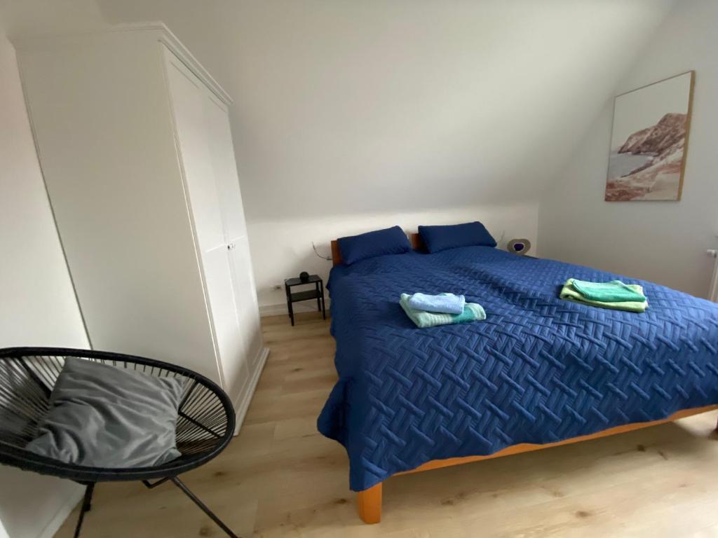 Postel nebo postele na pokoji v ubytování Haus Sunshine - Ferienwohnung Sunshine 1