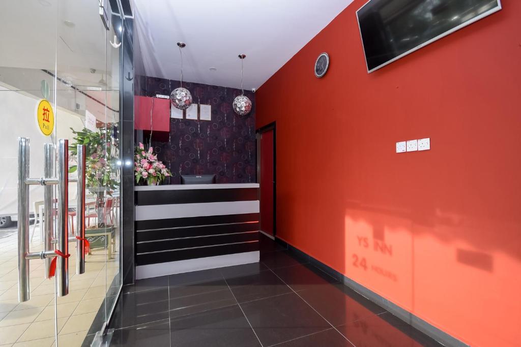 TV a/nebo společenská místnost v ubytování OYO 89301 Ys Inn