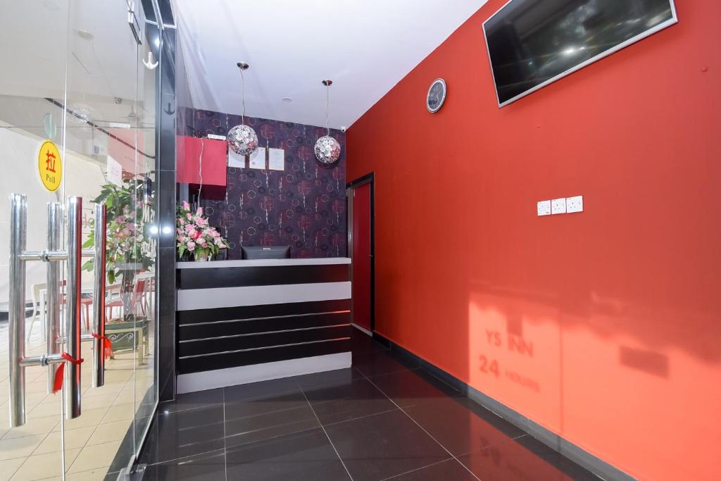 TV a/nebo společenská místnost v ubytování OYO 89301 Ys Inn