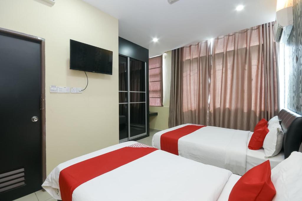 Postel nebo postele na pokoji v ubytování OYO 89301 Ys Inn
