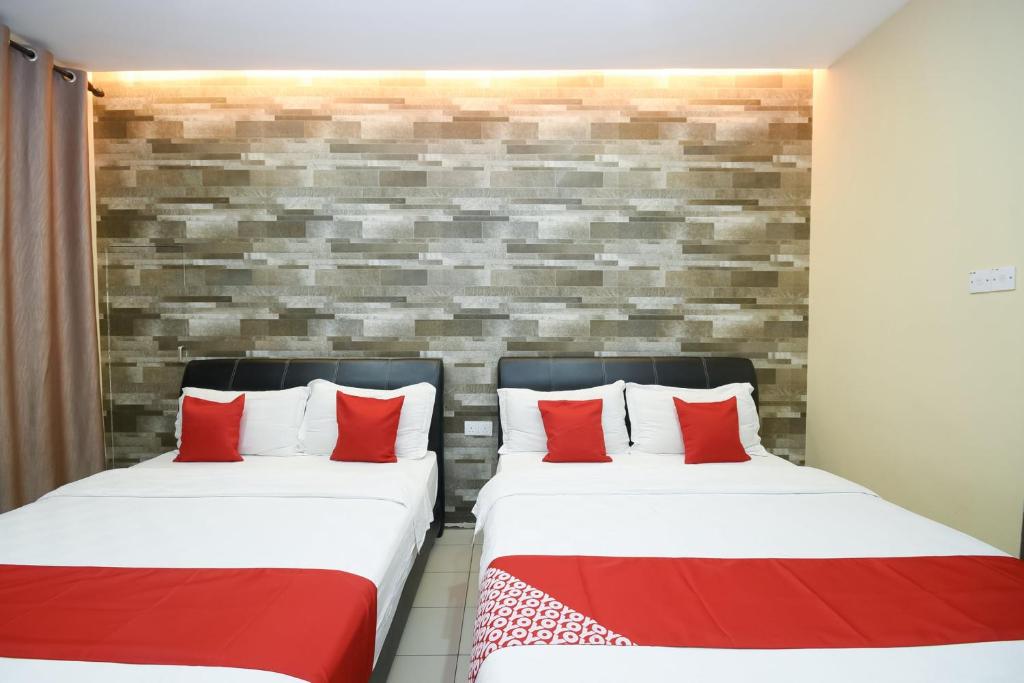 Postel nebo postele na pokoji v ubytování OYO 89301 Ys Inn