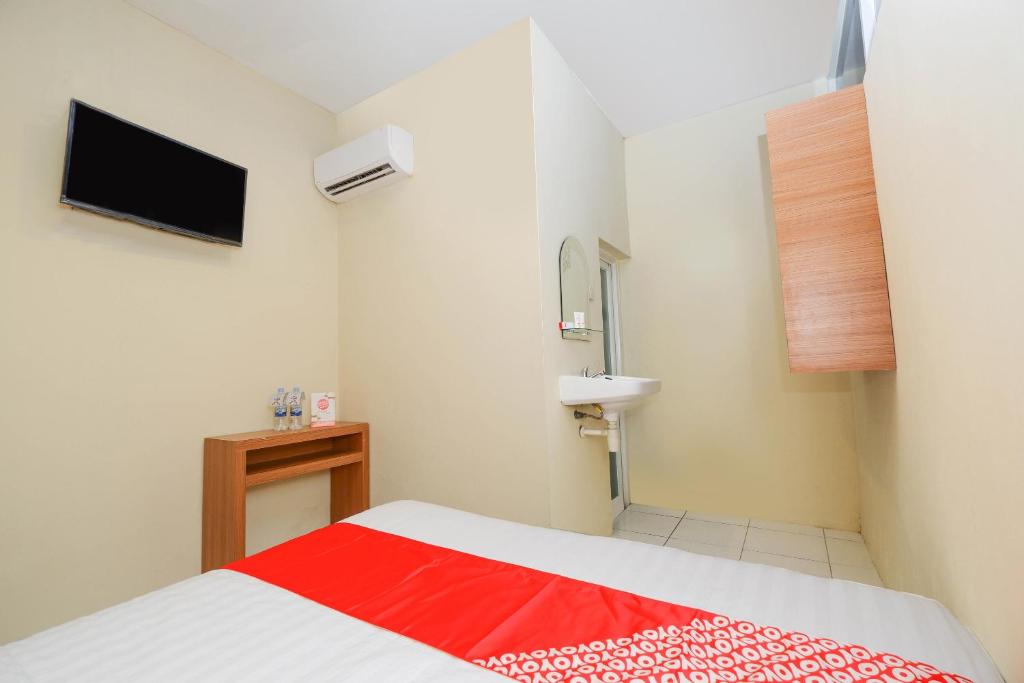 Postel nebo postele na pokoji v ubytování Unta Residence