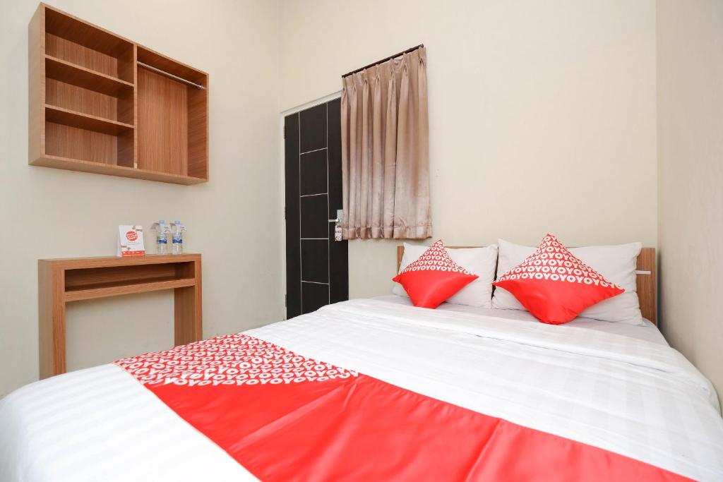Postel nebo postele na pokoji v ubytování Unta Residence