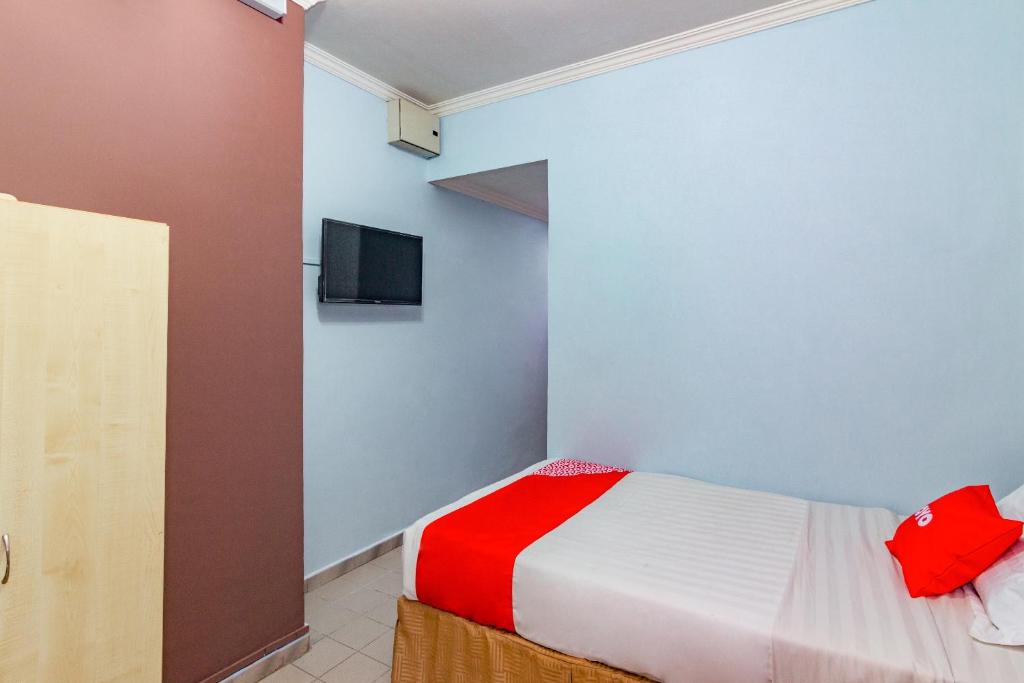 TV a/nebo společenská místnost v ubytování Super OYO 1159 Hotel New Sabah