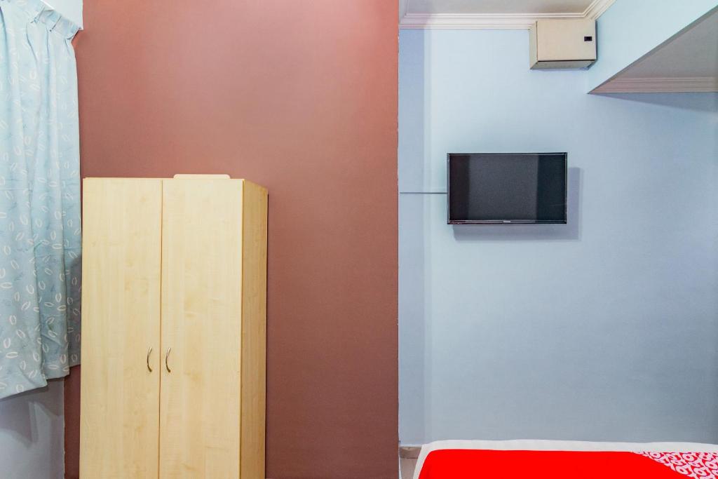 TV a/nebo společenská místnost v ubytování Super OYO 1159 Hotel New Sabah