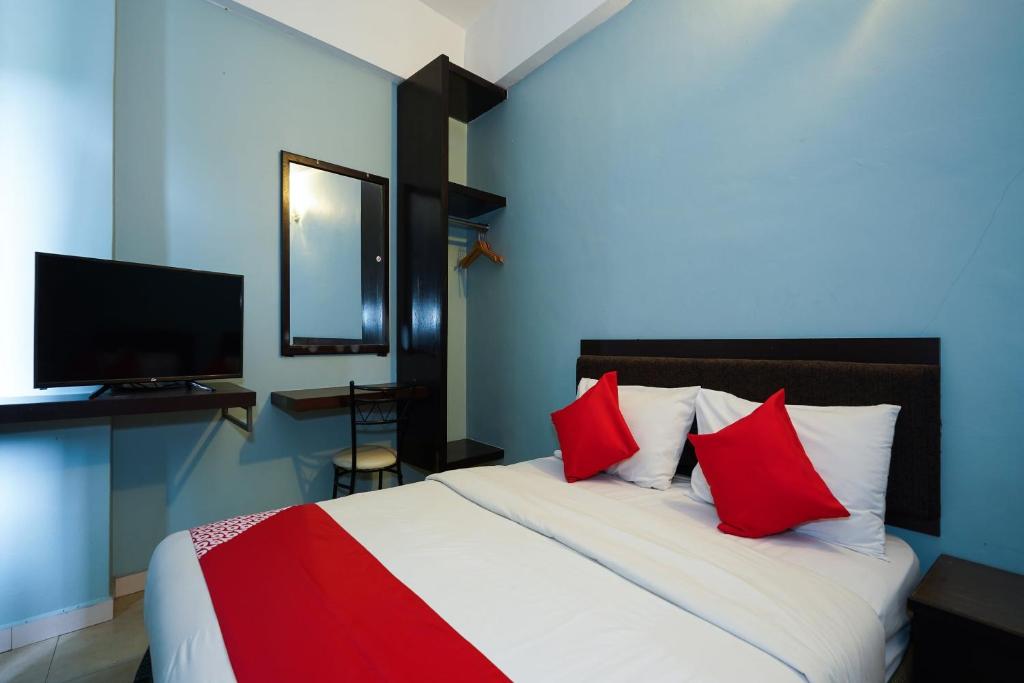 TV a/nebo společenská místnost v ubytování Hotel O Hotel Orchard Inn