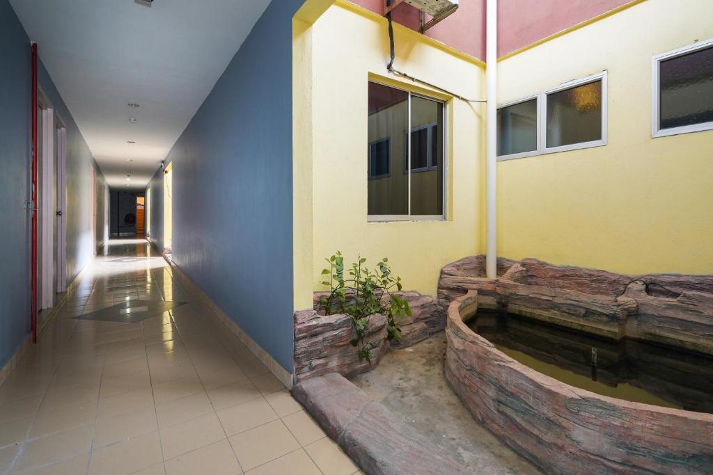 Fotografie z fotogalerie ubytování Hotel O Hotel Orchard Inn v destinaci Lumut