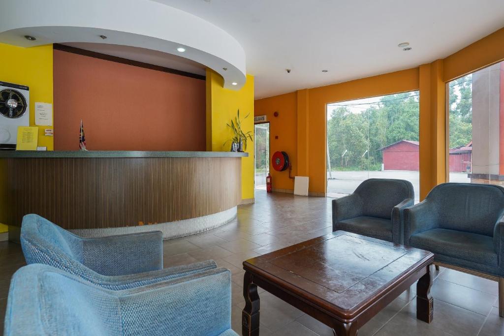 Posezení v ubytování Hotel O Hotel Orchard Inn