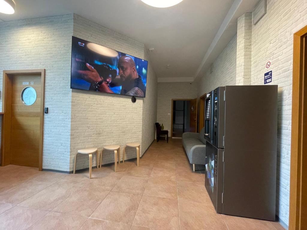 TV a/nebo společenská místnost v ubytování Sleep&Go Hostel Ljubljana