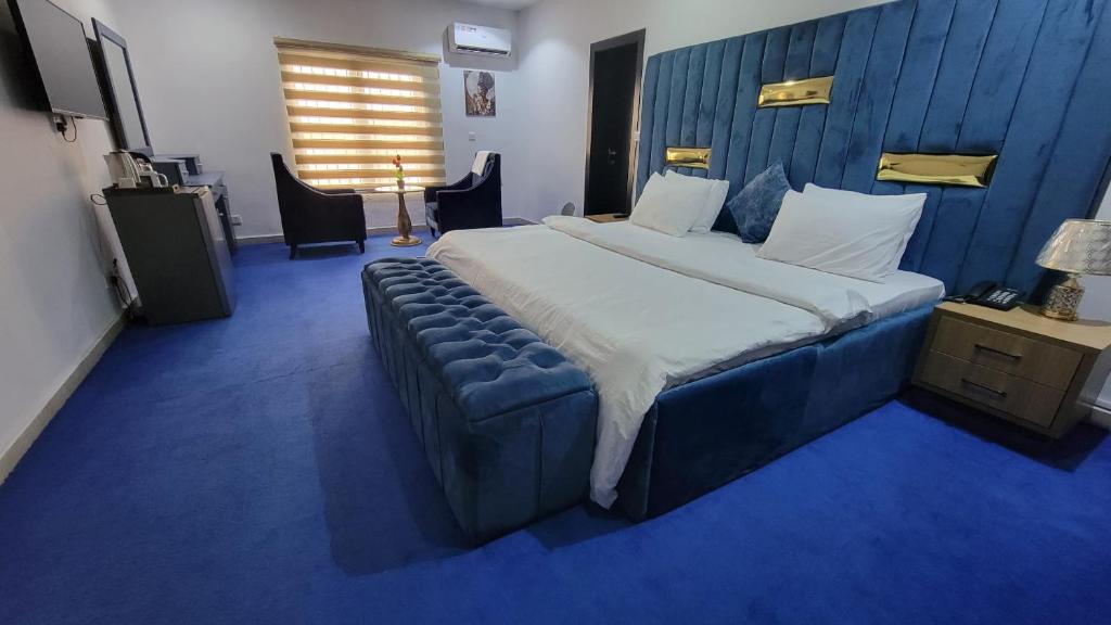 Ένα ή περισσότερα κρεβάτια σε δωμάτιο στο NDDC Clubhouse