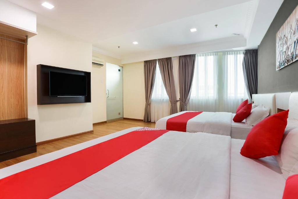 TV a/nebo společenská místnost v ubytování Collection O Hotel Super Cowboy